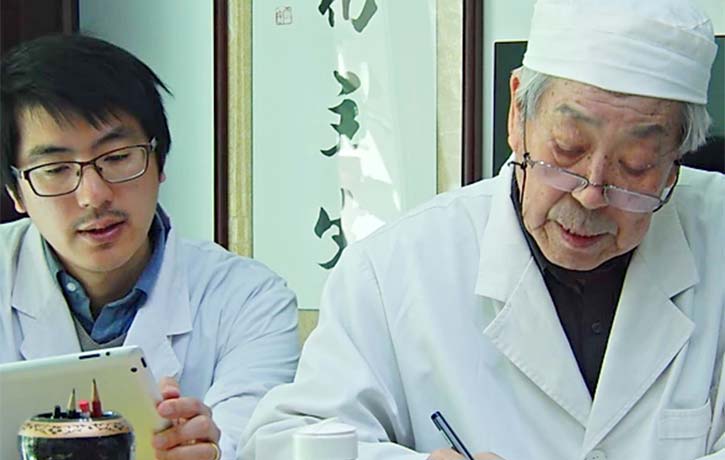 Doctor Wang Ju Yi with apprentice Jonathan