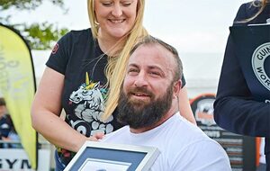 Martin with partner Beckie receives his Guinness World Record certificate