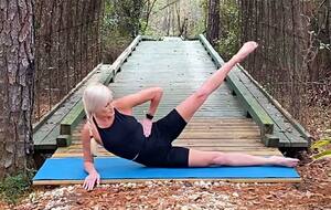 Leg raise Jen does outdoor yoga
